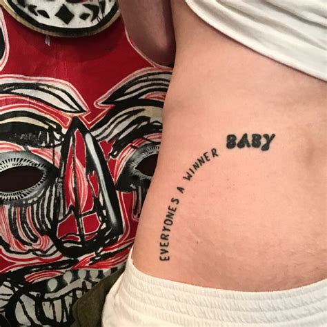 above butt tattoo|Above buttocks tattoo